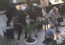 (ВИДЕО) ШОКАНТАН снимак: Полиција шутира везаног мушкарца приликом хапшења!
